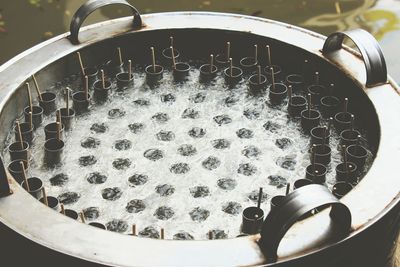 Close-up of wet kulfi ice cream molds