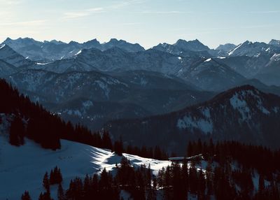 Scenic view of snowcapped mountains against sky