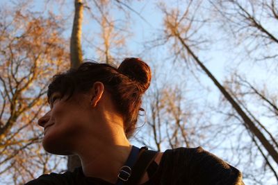 Low angle view of woman against sky