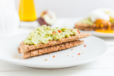 Close-up of breakfast served on table