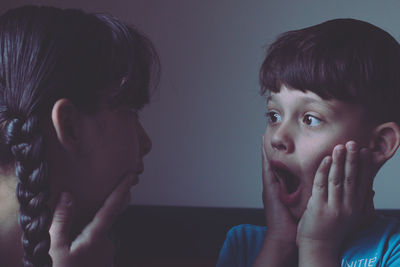 Close-up portrait of mother with baby