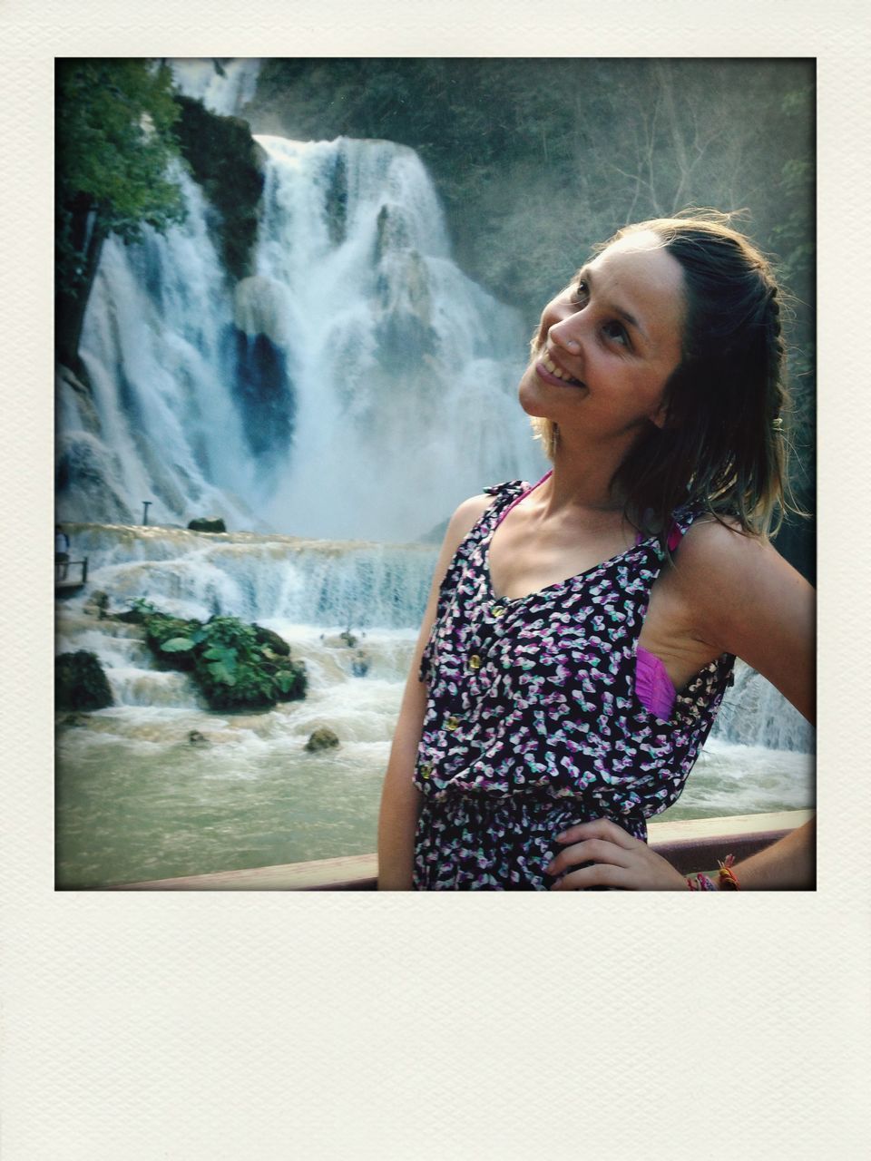 transfer print, water, auto post production filter, lifestyles, leisure activity, young adult, person, motion, young women, waterfall, splashing, front view, casual clothing, vacations, portrait, looking at camera, headshot, long hair