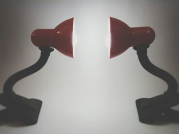 Close-up of eyeglasses on table against white background