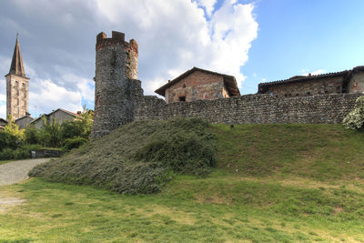 Castle against cloudy sky