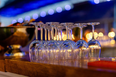 Close-up of illuminated candles on table