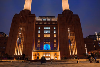 New battersea power station in london england uk at night operating as a new shopping mall