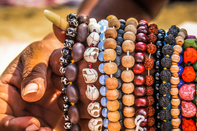 Close-up of multi colored jewelry for sale in market