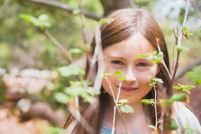 Portrait of girl with plants