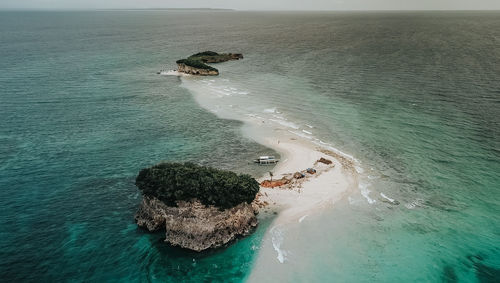 High angle view of rock in sea