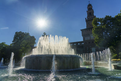 Fountain in front of historical building