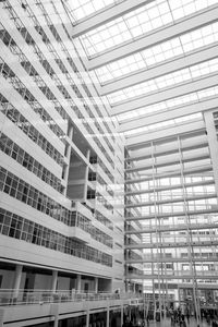 Low angle view of modern buildings against sky