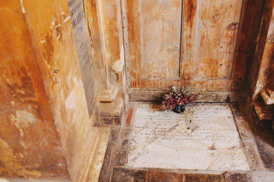 High angle view of people on wooden wall of building