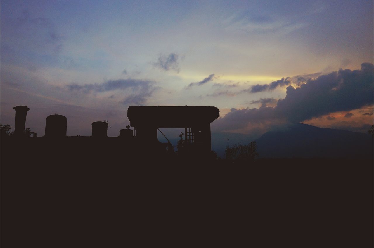 silhouette, sunset, sky, built structure, architecture, building exterior, cloud - sky, scenics, beauty in nature, tranquil scene, tranquility, nature, dusk, cloud, landscape, cloudy, dark, dramatic sky, idyllic, outdoors