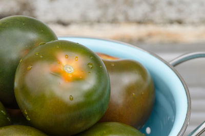 Close-up of fruits in plate