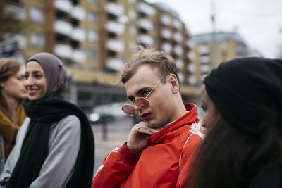 Multi-ethnic group of teenagers on street