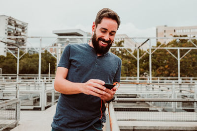 Young man using mobile phone