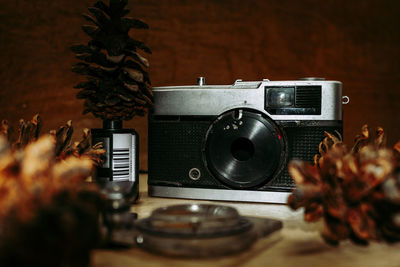 Close-up of camera on table