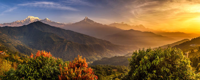 Panoramic view of mountains against sky during sunset