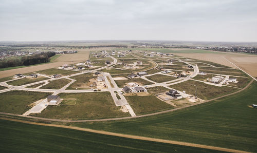 Aerial view of agricultural field against sky