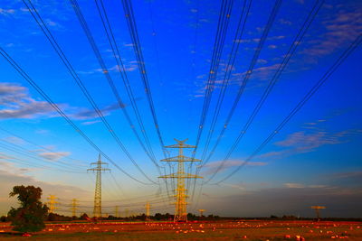 Scenic view of field against sky during sunset