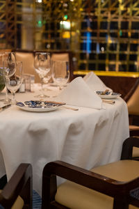 Empty chairs and table in restaurant