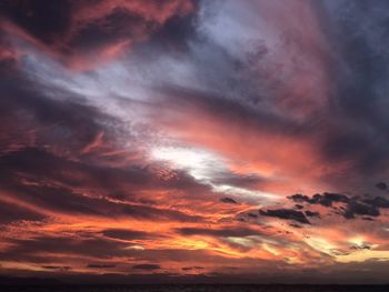 Low angle view of dramatic sky during sunset