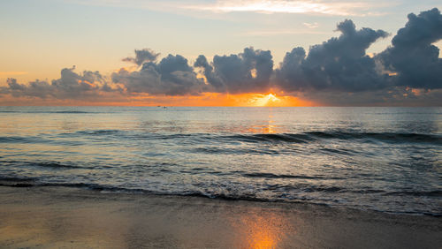 Scenic view of sea against sky during sunset