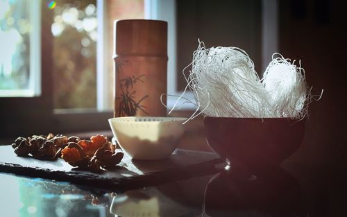 Close-up of ice cream on table at home