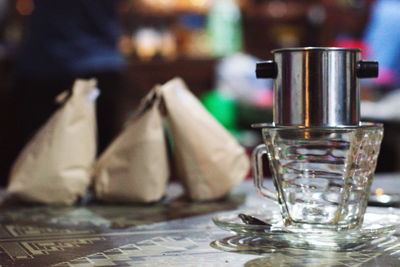 Close-up of wine in glass on table