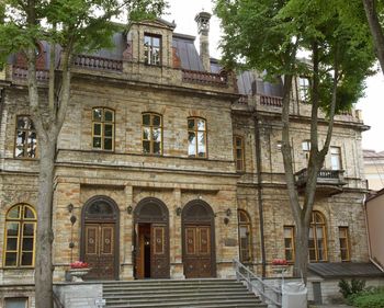 Low angle view of old building in city