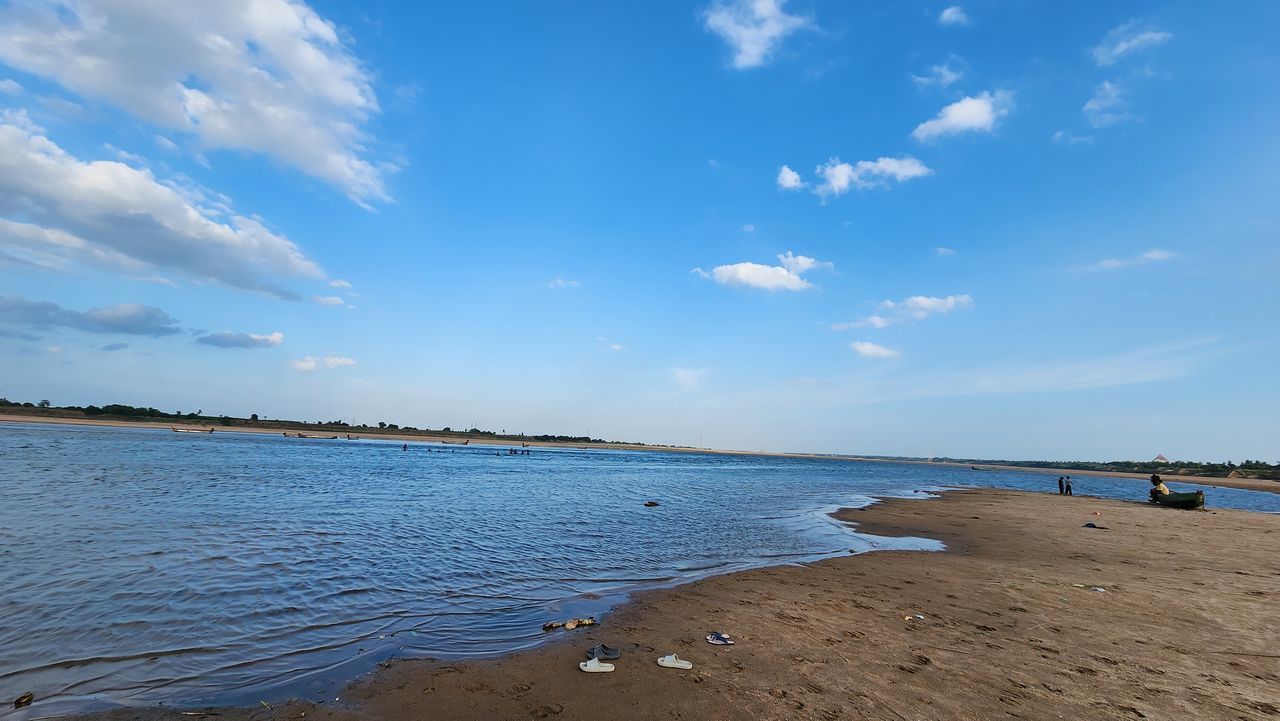 water, sky, sea, land, beach, body of water, shore, cloud, horizon, scenics - nature, sand, nature, beauty in nature, ocean, travel destinations, tranquility, travel, coast, blue, holiday, environment, trip, vacation, coastline, tranquil scene, landscape, tourism, wave, outdoors, day, water's edge, bay, summer, seascape, horizon over water, no people, non-urban scene, idyllic, architecture, island, relaxation, bay of water, wind wave