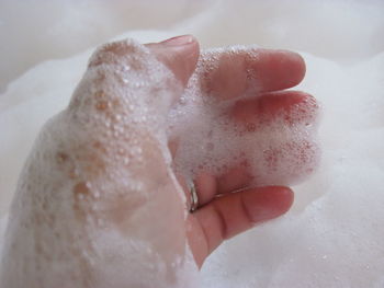 Close-up of woman hand holding ice cream