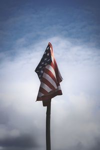 Low angle view of flag against sky