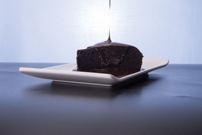 Close-up of chocolate cake on table