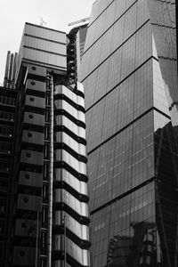 Low angle view of modern buildings against sky