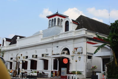 Facade of historic building against sky