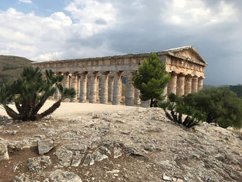 Old ruin building against cloudy sky