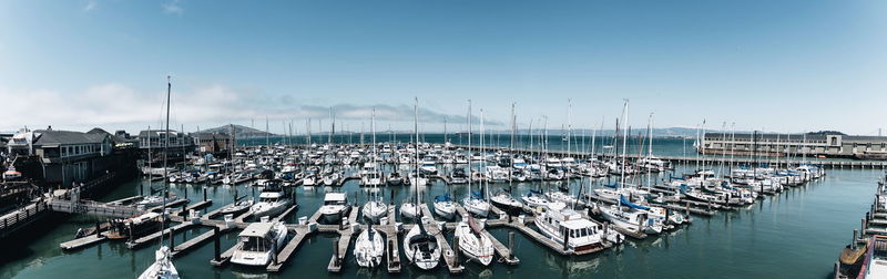 High angle view of boats moored at harbor