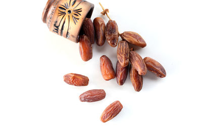 High angle view of fruits against white background