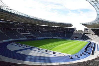 Low angle view of soccer field against sky