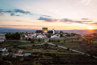 High angle view of townscape against sky at sunset