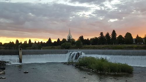 Panoramic view of lake against sky during sunset