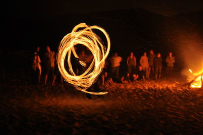 Close-up of illuminated bonfire at night