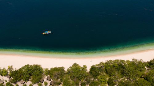 Island with beautiful beach by turquoise water. great santa cruz island. 