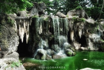 View of waterfall in cave