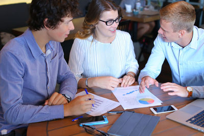 Business colleagues working at office