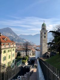 Buildings in city against sky