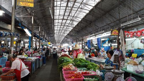 Group of people at market stall