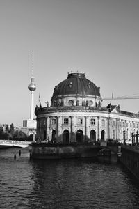 Bode museum by river against fernsehturm