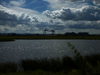 Scenic view of sea against cloudy sky